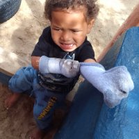 PK Harrison wrestles with his socks